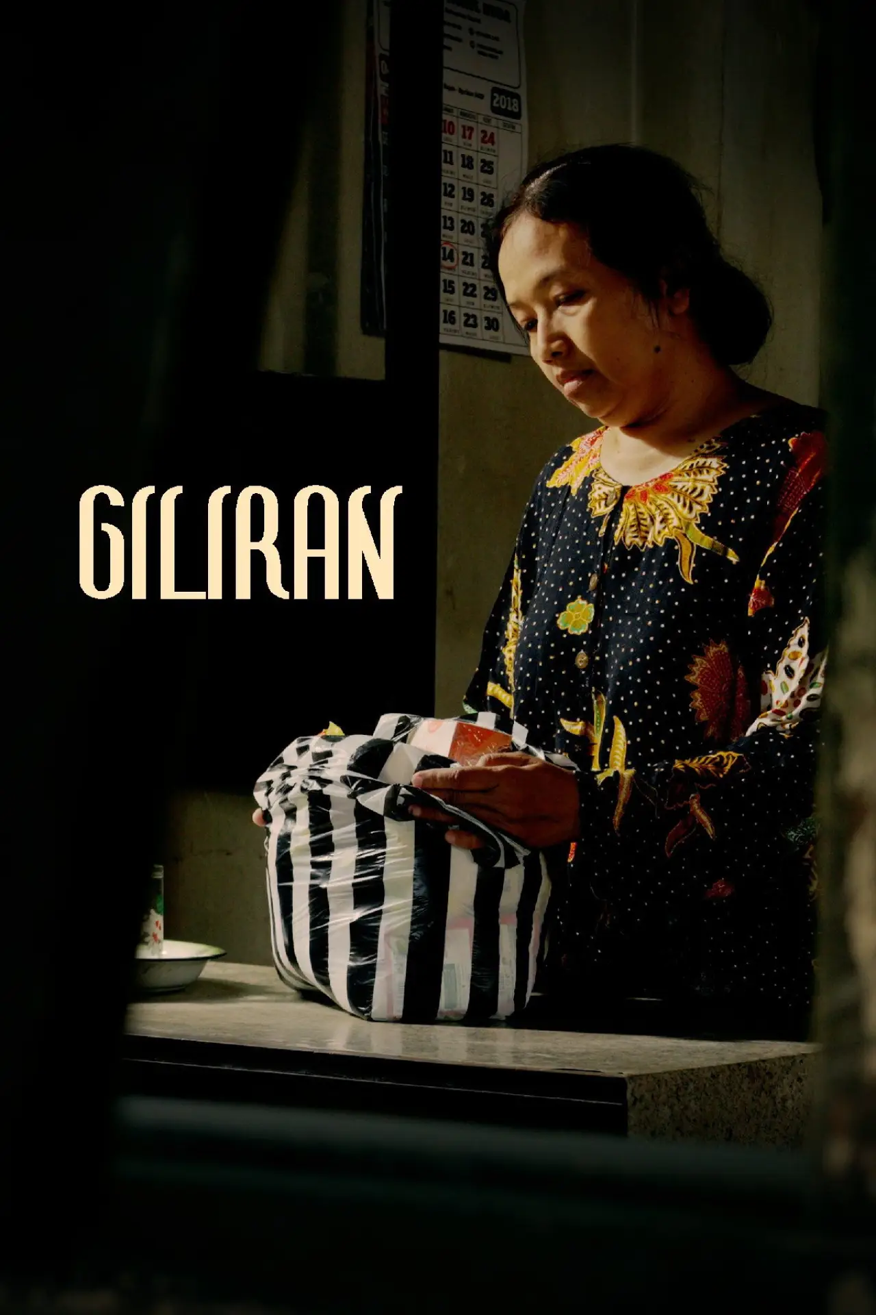 Постер к фильму "Giliran"