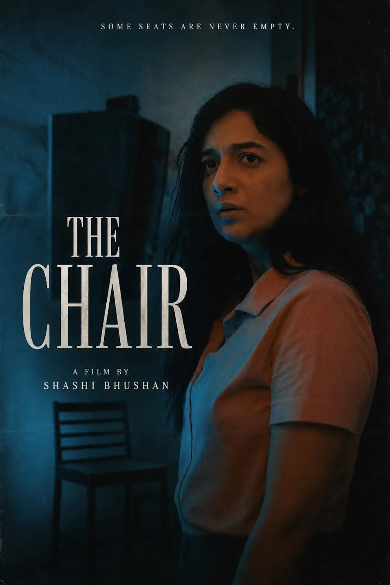Постер к фильму "The Chair"