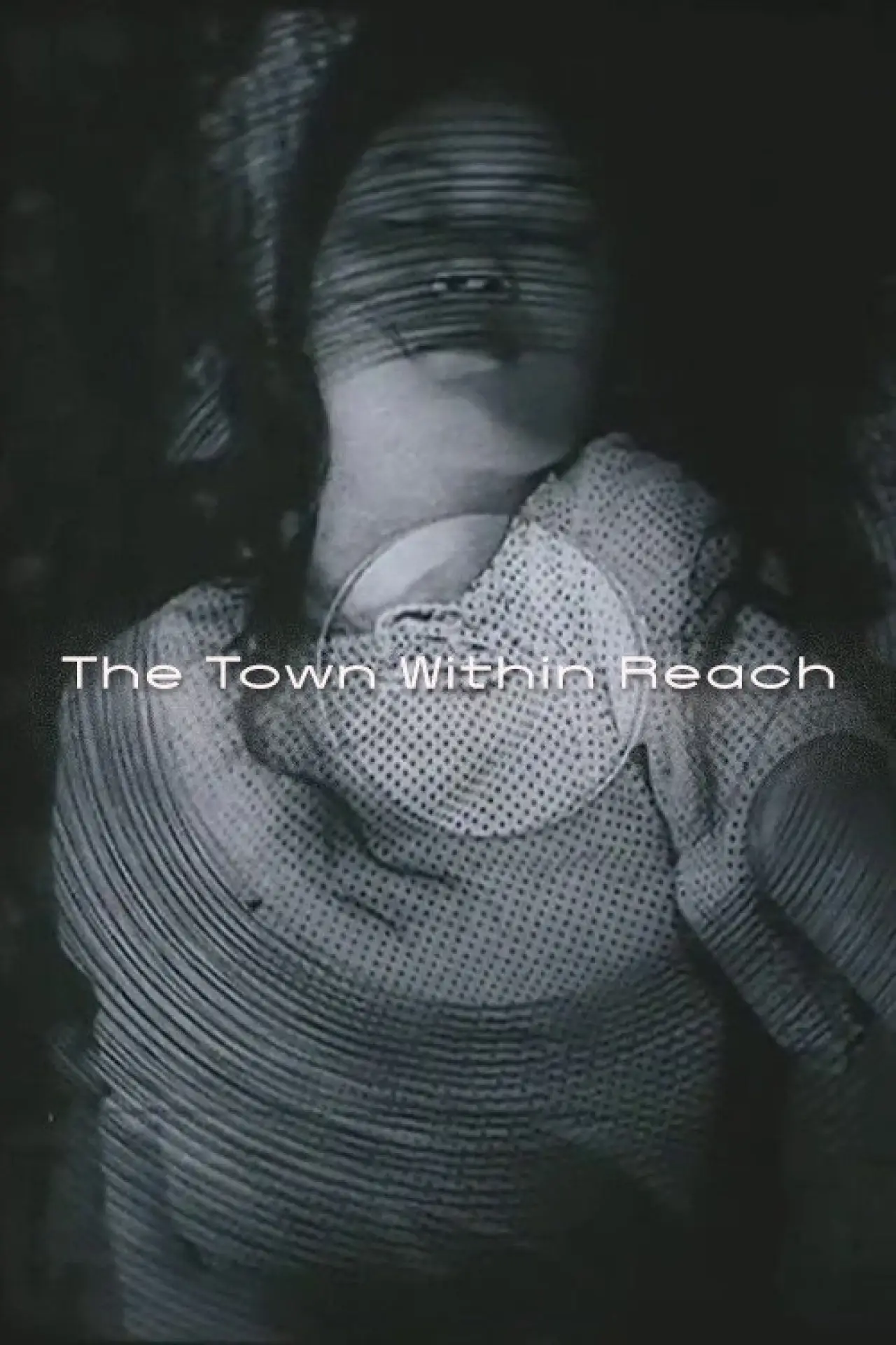 Постер к фильму "The Town Within Reach"