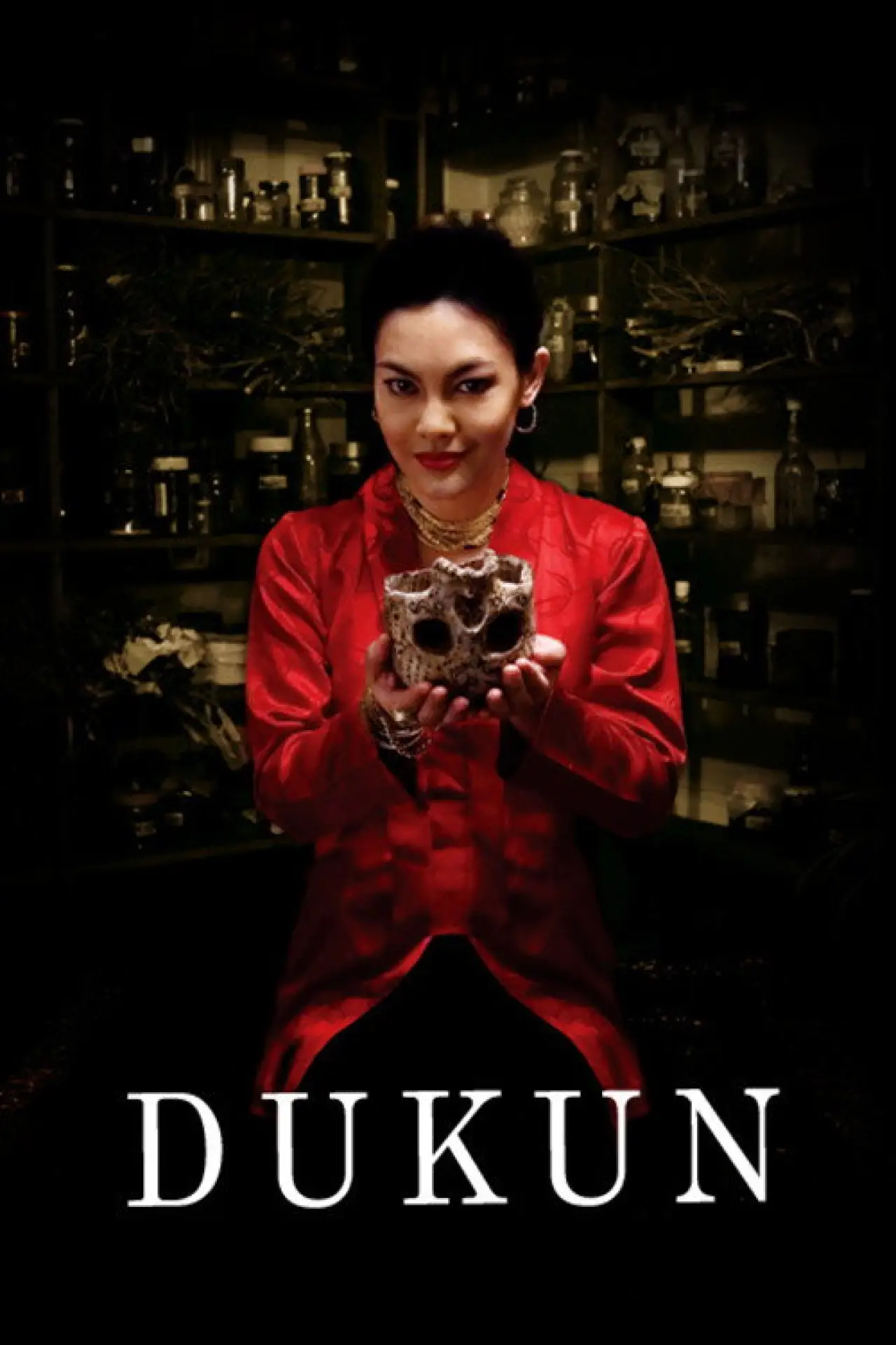 Постер к фильму "Dukun"