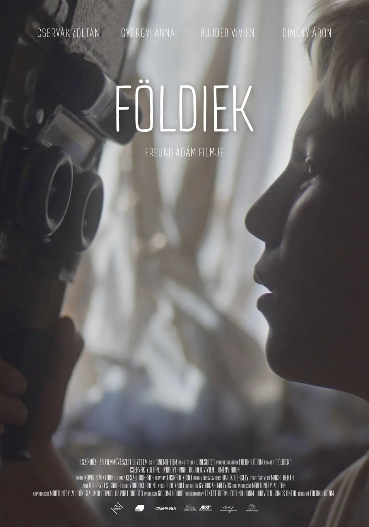 Постер к фильму "Földiek"