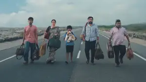 Задник к фильму "டூரிஸ்ட் ஃபாமிலி" #623560