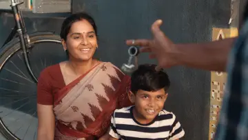 Задник к фильму "கார்மேனி செல்வம்" #844149