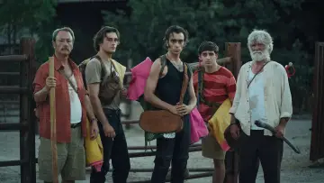 Una cabeza en la pared постер