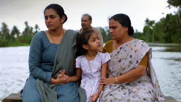 Задник к фильму "ഉള്ളൊഴുക്ക്" #1120819