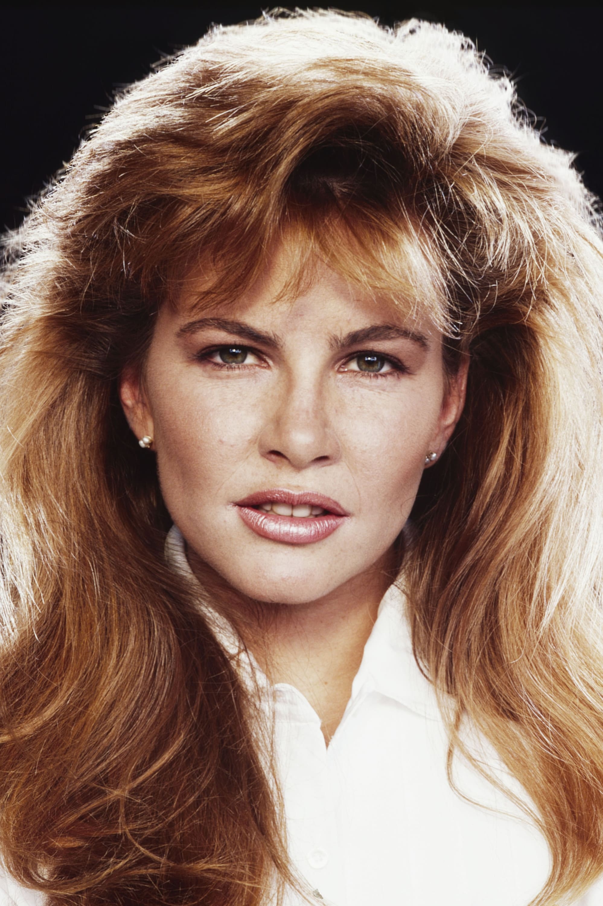 Фото  (Tawny Kitaen)