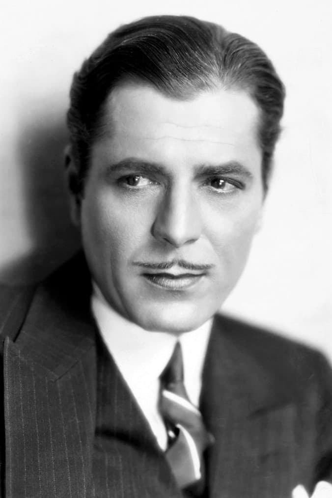 Фото  (Warner Baxter)