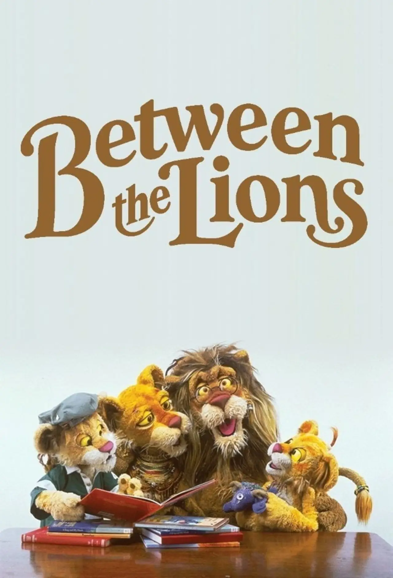 Постер к сериалу "Between the Lions"