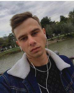 Александр Харужин