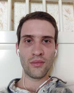 Александр Николаев