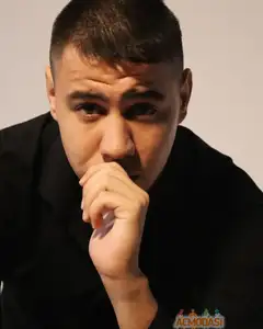 Максим Серов