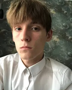 Тим Каус