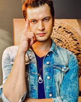 Максим Олейник